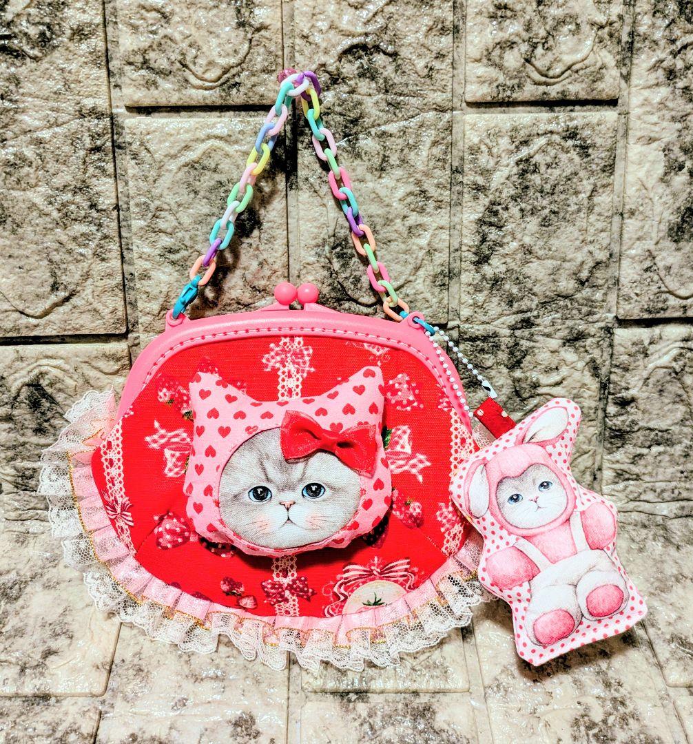 コヤンイサムチョン ルミ がま口ポーチ持ち手付き&チャーム付き - メルカリ