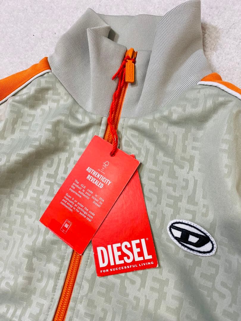 8437. 【未使用タグ付き】DIESEL 総柄トラックジャケット - メルカリ