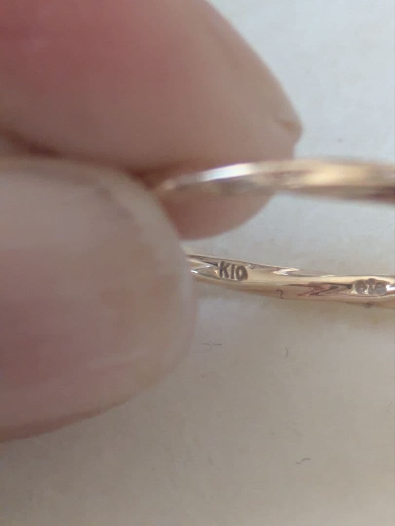 ete K10 ハートモチーフツイスト リング - メルカリ