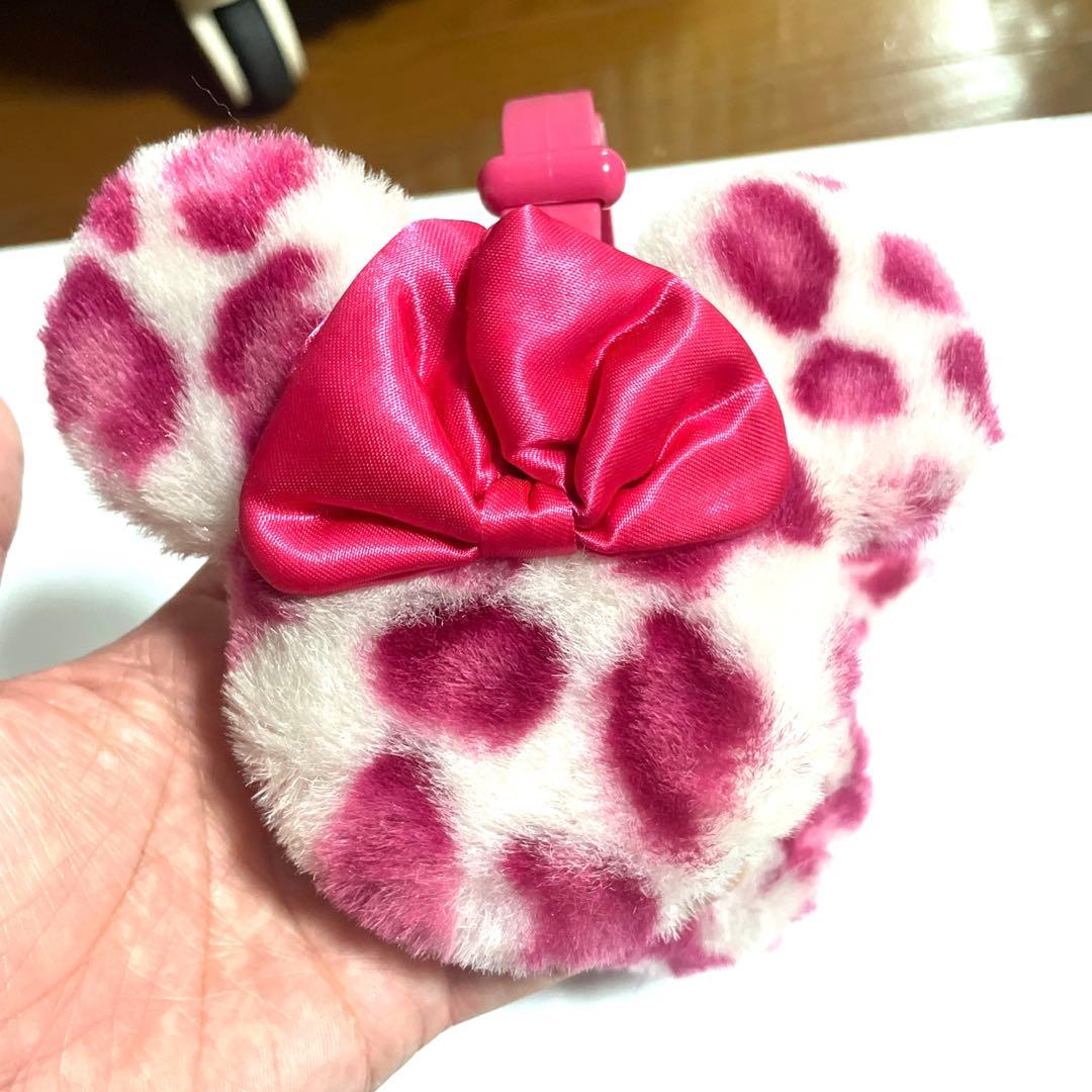 ディズニーリゾート ミニー ピンク・白ヒョウ柄リボン付き耳あて