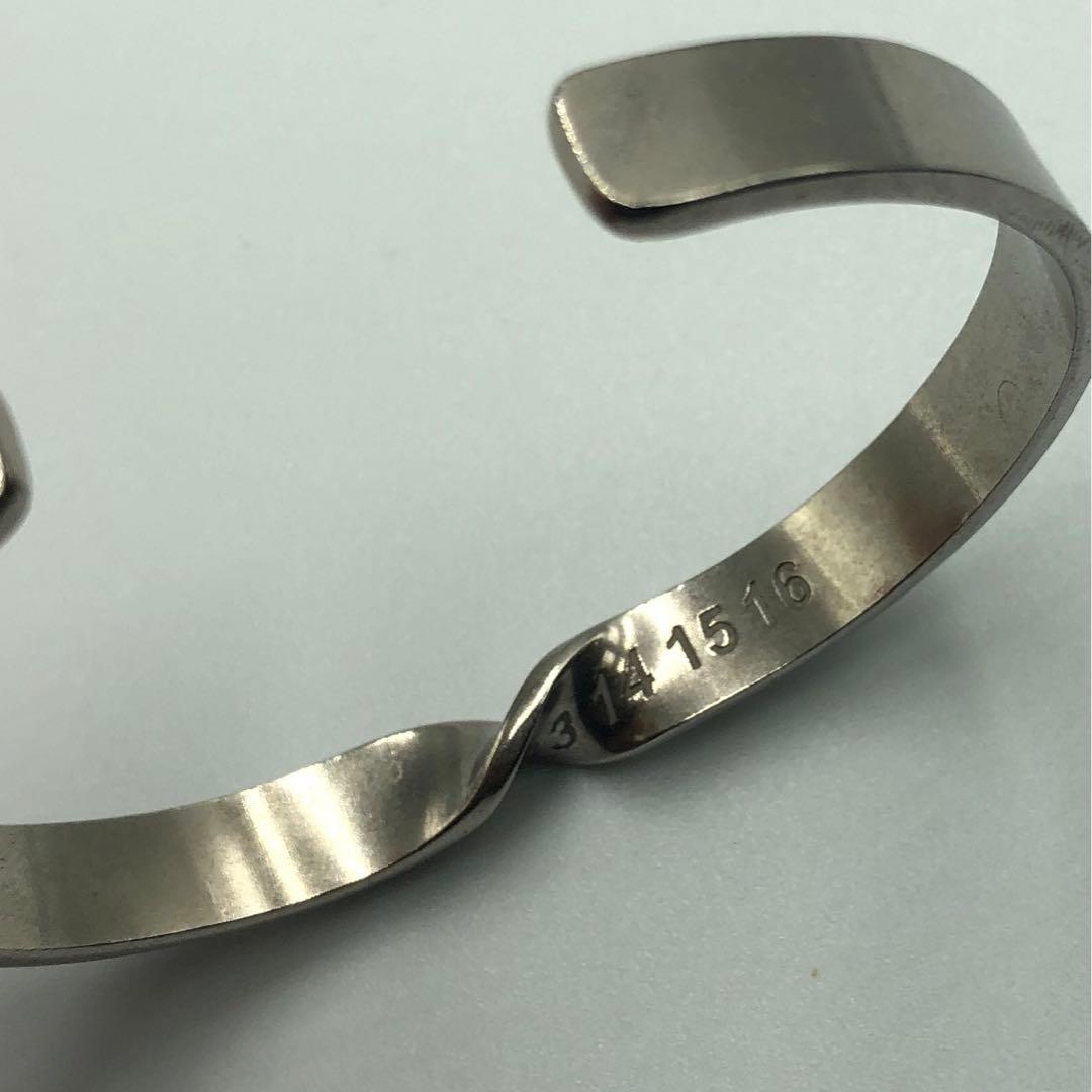 美品 Martin Margiela ツイストバングル シルバー カレンダー - メルカリ