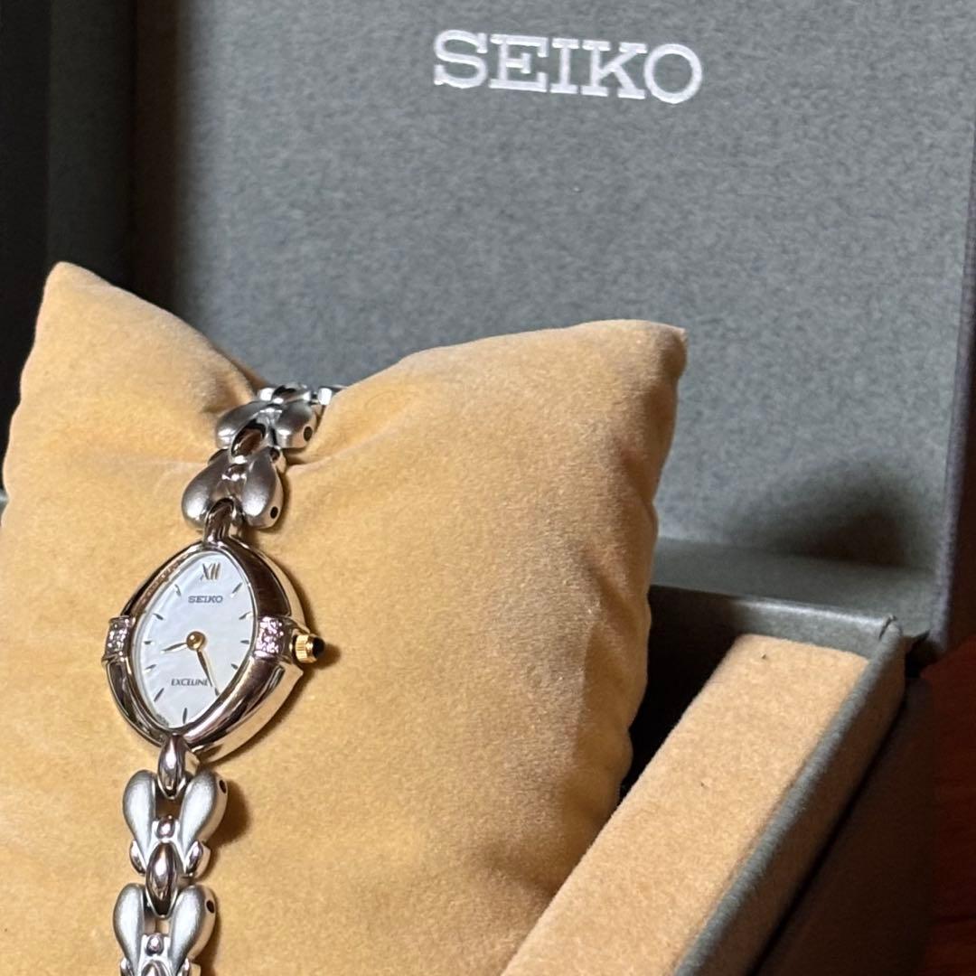 未使用品SEIKO セイコー エクセリーヌ レディース クォーツ 稼働品 新品・未使用品】セイコーSEIKO エクセリーヌ レディース 黒革ベルト