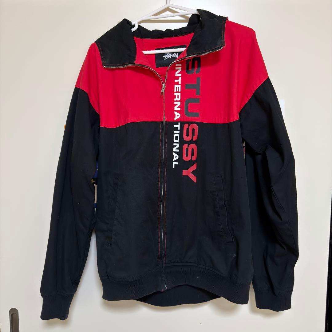 STUSSY フード付きナイロンジャケット - メルカリ