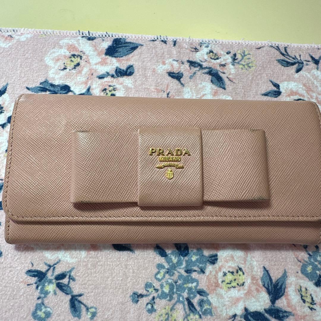 PRADA リボン付き長財布 ピンク - メルカリ