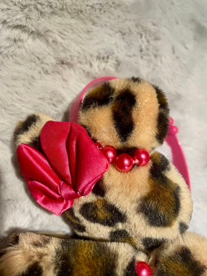 希少品】TDL ディズニー ミニー ヒョウ柄ファー耳あて - メルカリ