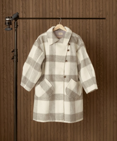 moi tytto（モイテュット）の「【取り外しリボン付き】シャギーミディ