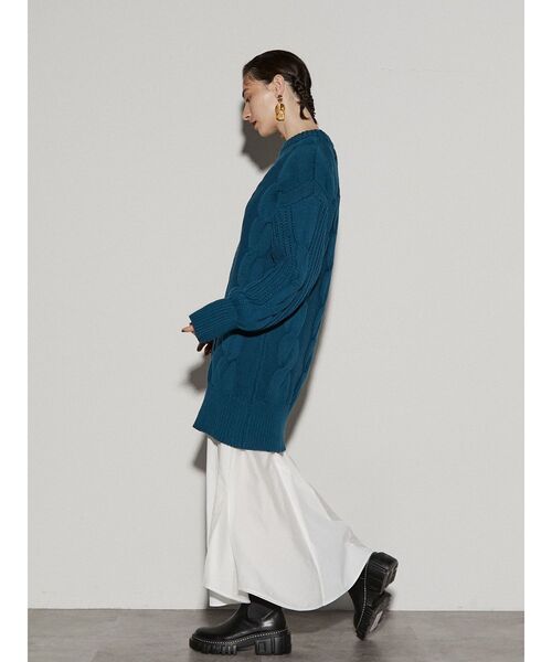 UN3D.（アンスリード）の「レイヤードケーブルニットワンピース