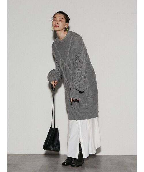 UN3D.（アンスリード）の「レイヤードケーブルニットワンピース