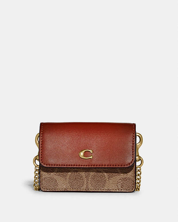 美品 COACH ポーチ がま口 シグネチャー キャンバス パープル 美品