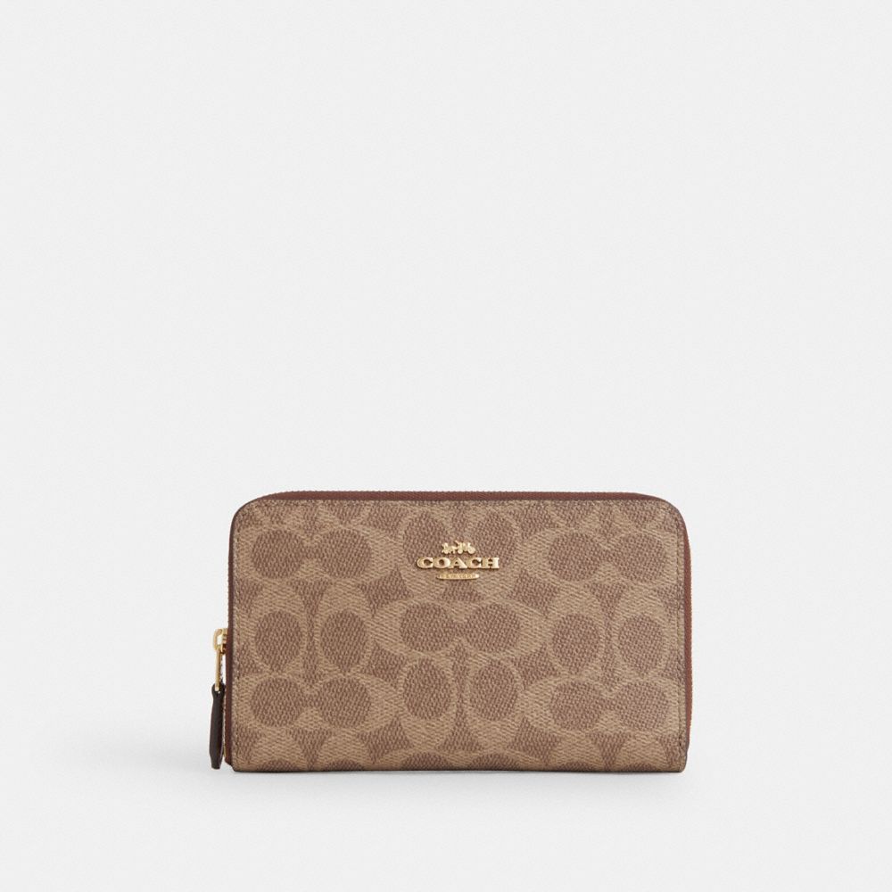 COACH® Outlet | Medium Id Zip Wallet In Signature Canvas